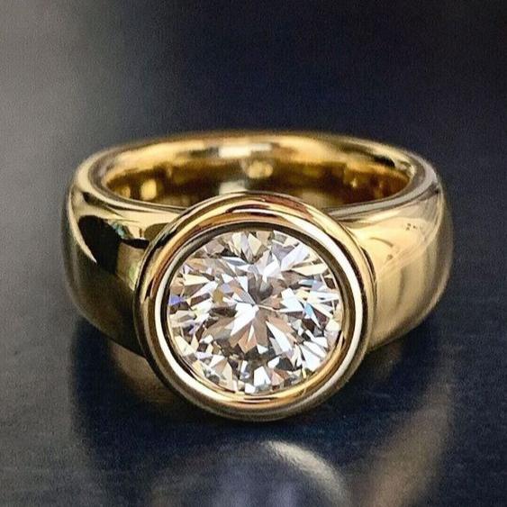 Ring van gesmeed goud met vintage zirkonia's