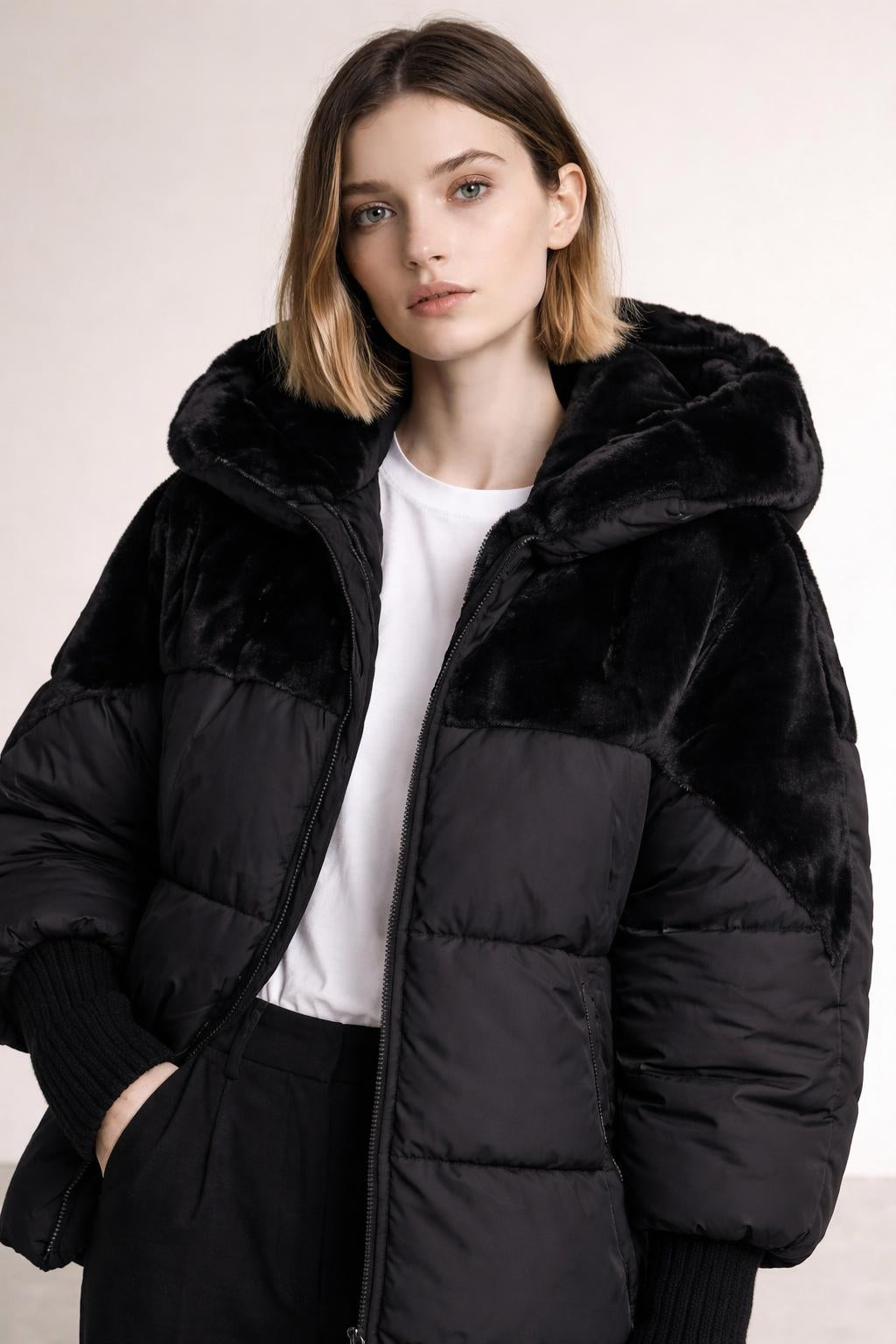 Close-up of the model wearing Yohan - Patchwork-Puffer mit Kapuze