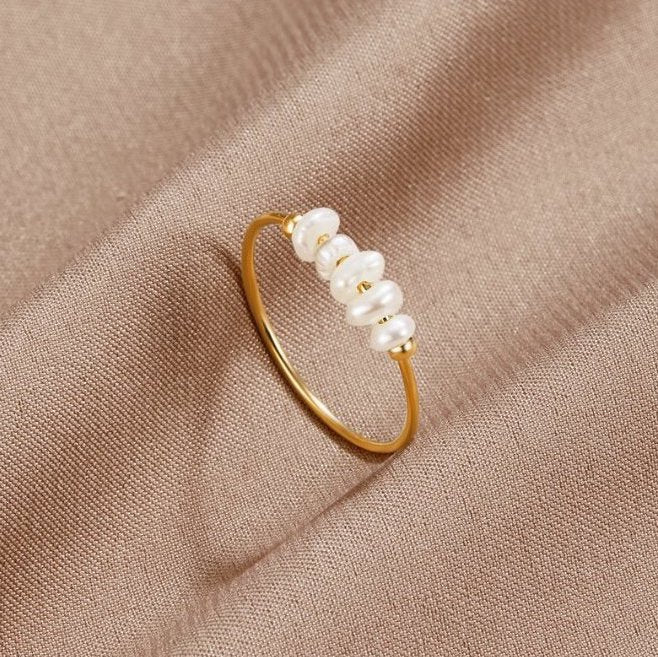 Vergulde ring met elegante parels