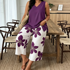 Set aus asymmetrischem Damenoberteil und Caprihose mit Blumenmuster – vielseitig, farbenfroh, bequem 🌺